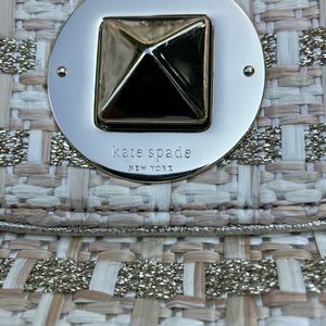 Kate Spade Handbag in ivory and gold with a 23” shoulder chain.